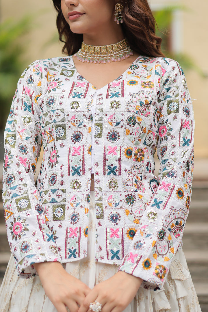 Ivory Jacquard Lehenga with Embroidered Peplum Jacket Top – Full-Stitched Designer Set