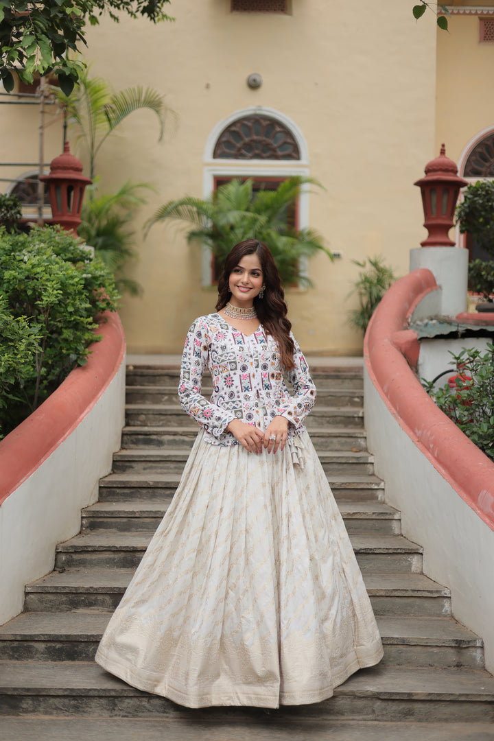 Ivory Jacquard Lehenga with Embroidered Peplum Jacket Top – Full-Stitched Designer Set